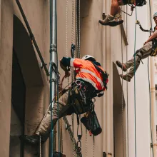 Dean Bennett workers on building
