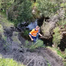 Taking 4G signal measurements in Tasmanian gully