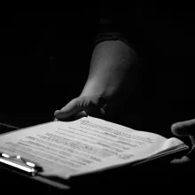 man holding clipboard form